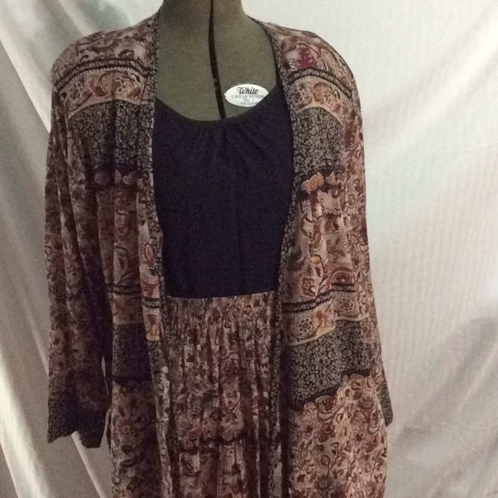 Three piece skirt, jacket and camisole top.  A26